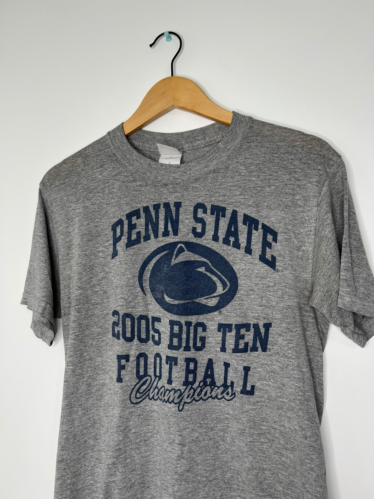 Vintage Penn State Big Ten graphic T-shirt by Elektra Vintage, featuring a classic team logo and retro design.