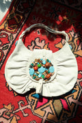 Vintage white boho hobo bag by Elektra Vintage with colorful beaded turquoise embellishments and soft leather straps.