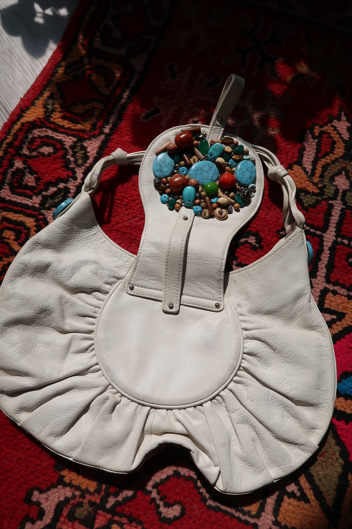 Vintage white boho hobo bag by Elektra Vintage with colorful beaded turquoise embellishments and relaxed shoulder style.