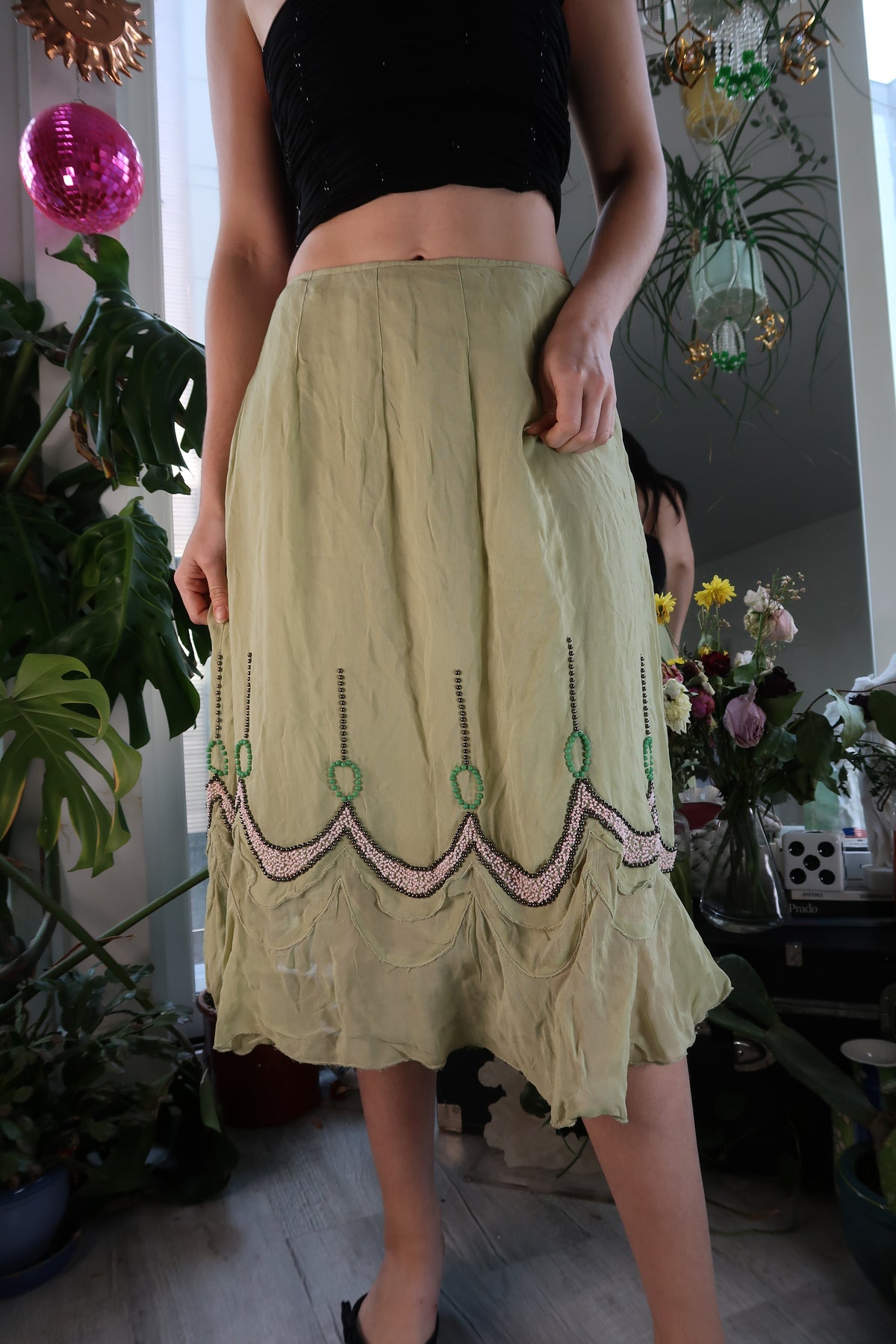 Elektra Vintage green flowy beaded midi skirt with a relaxed fit and intricate bead detailing, perfect for bohemian style.