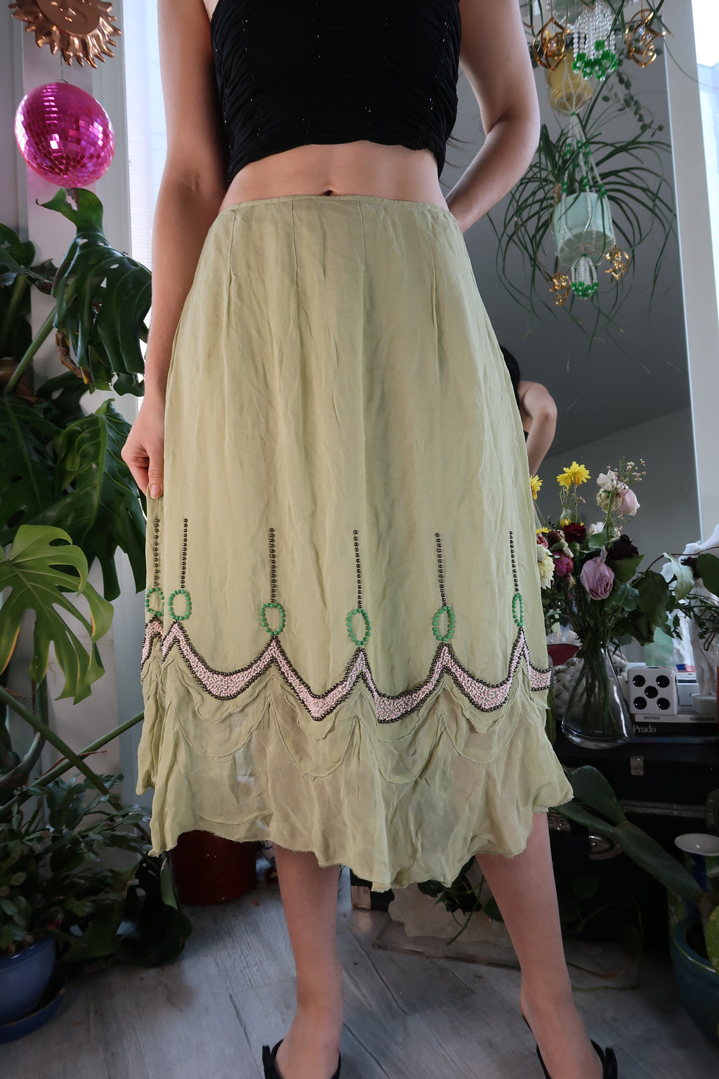 Elektra Vintage green beaded midi skirt with flowy fabric and intricate bead details, perfect for boho or casual wear.