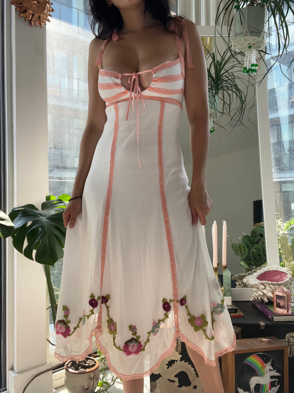 Vintage white Betsey Johnson floral dress by Elektra Vintage, featuring a fitted bodice and flowing skirt.