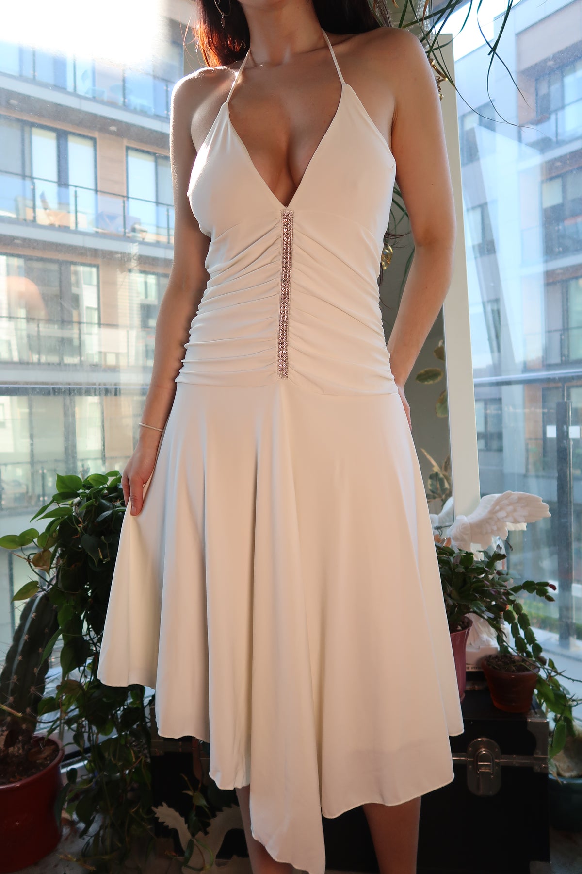 Vintage 2000s Charlotte Russe white rhinestone midi dress by Elektra Vintage, featuring a fitted silhouette and sparkling embellishments.