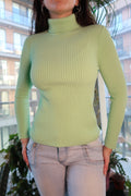 Vintage 70s lime green ribbed turtleneck for women by Elektra Vintage, showcasing a fitted knit top with a high collar.