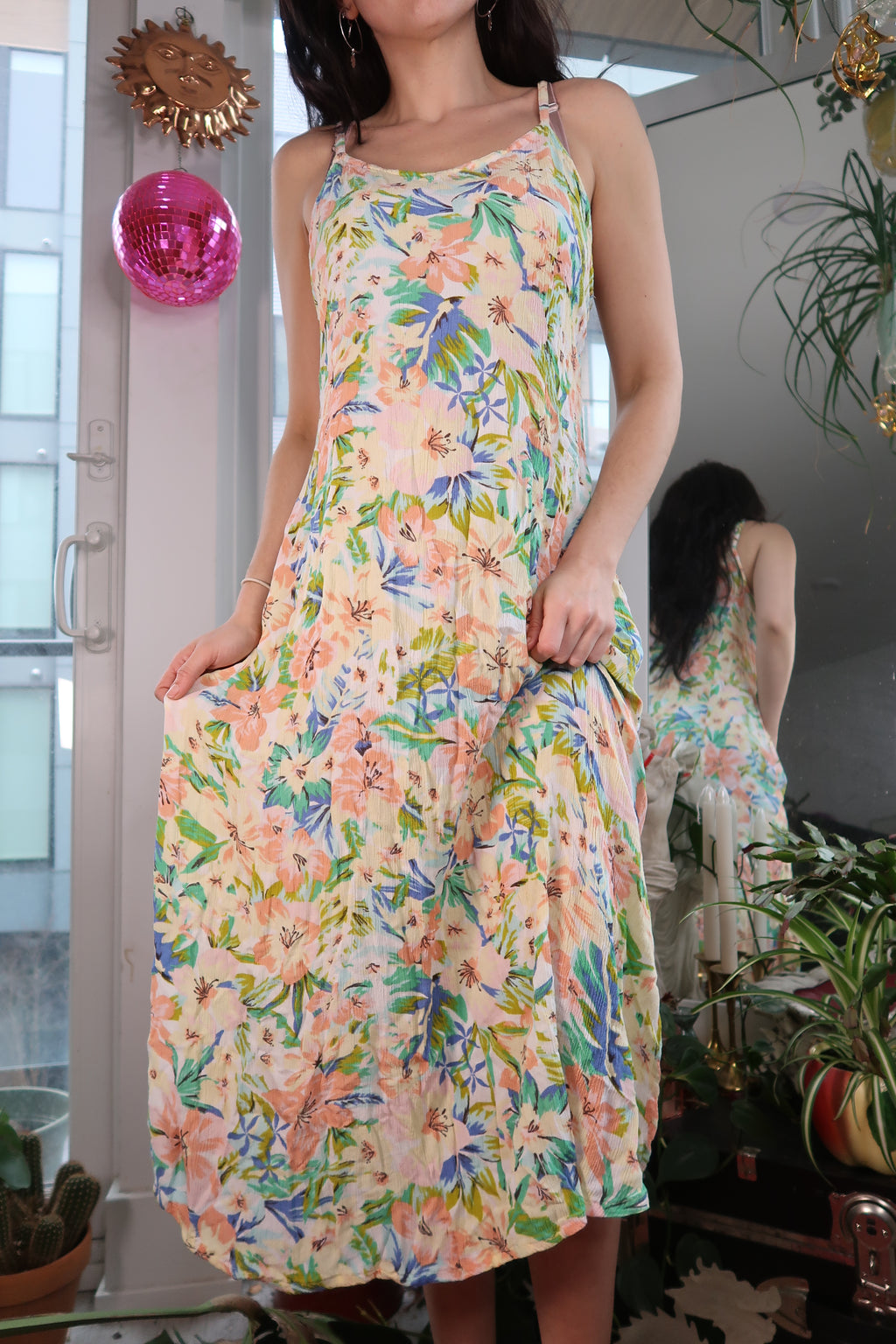 Elektra Vintage tropical floral midi dress with vibrant patterns, fitted waist, and flowy skirt, perfect for summer or casual occasions.