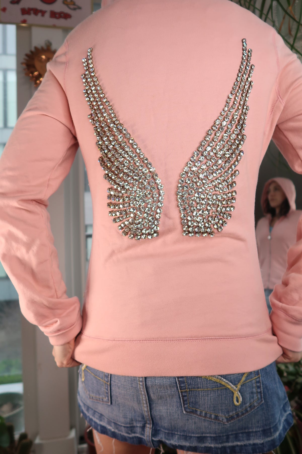 Women's 2000s rhinestone angel wings hoodie by Elektra Vintage, featuring sparkling rhinestone angel wing design on the front.