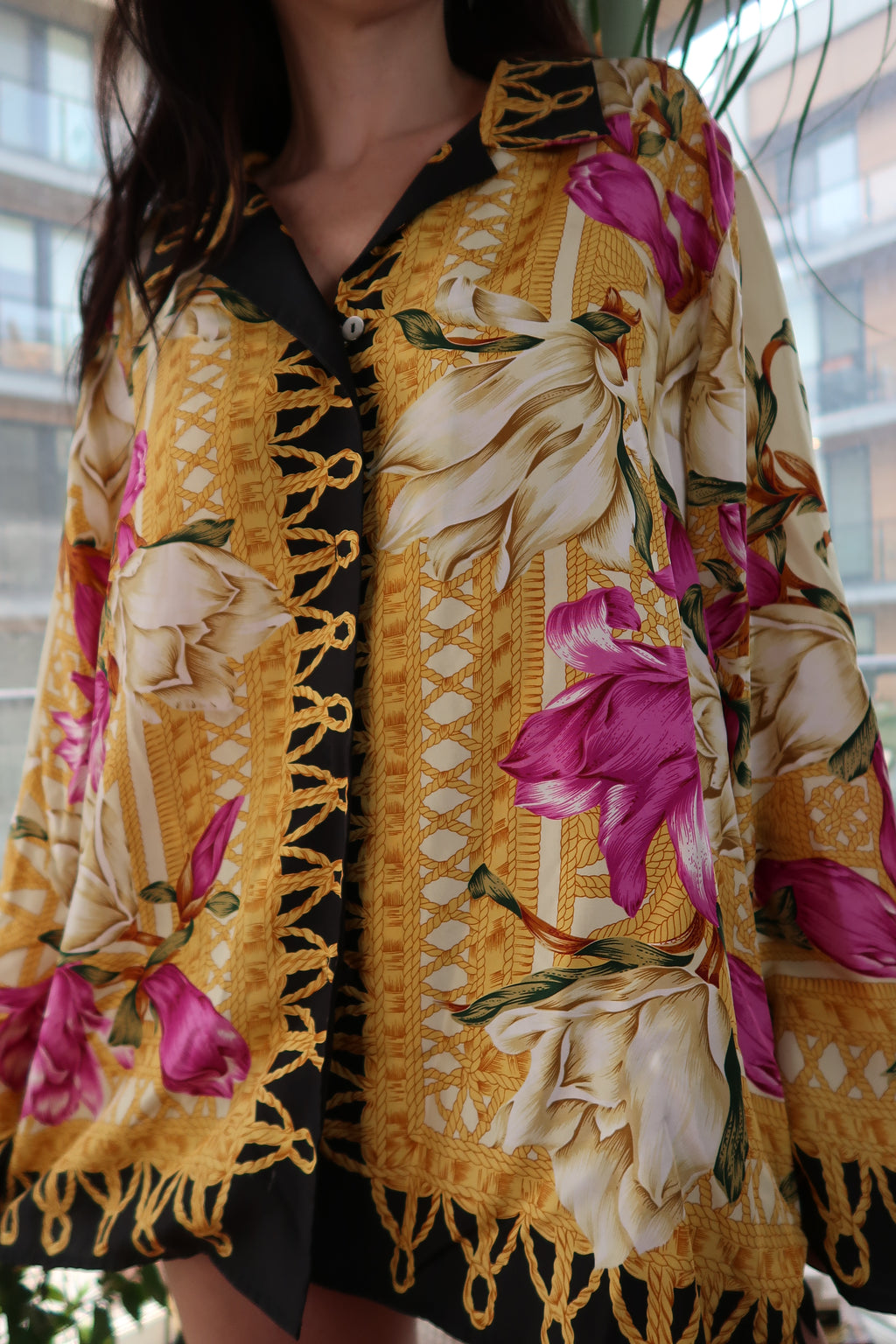 Elektra Vintage women's silk floral baroque shirt with bold gold and orchid print, featuring a vintage Neiman Marcus design.
