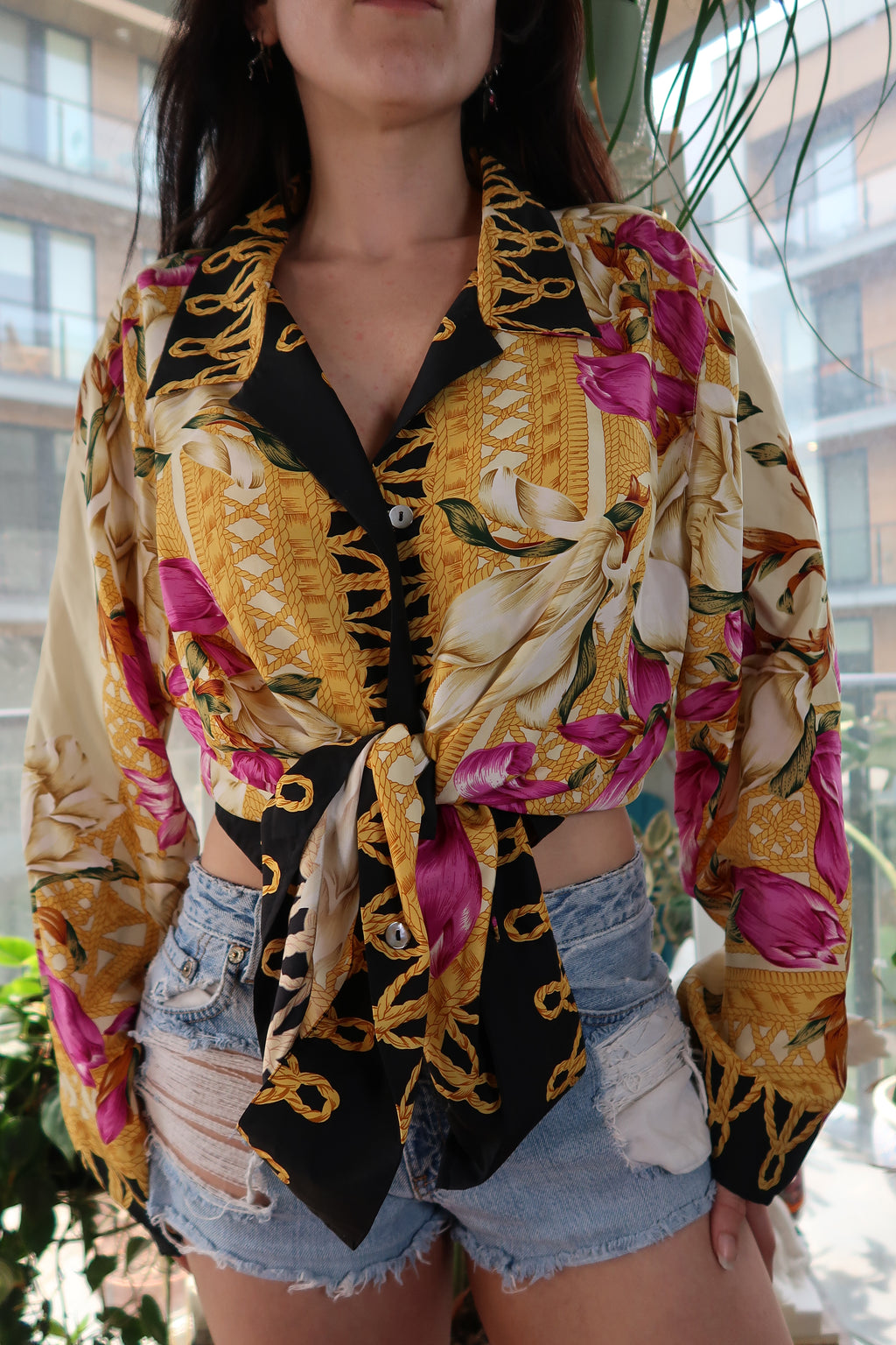 Elektra Vintage women's silk floral baroque shirt with bold gold and orchid print, showcasing a luxurious vintage top.