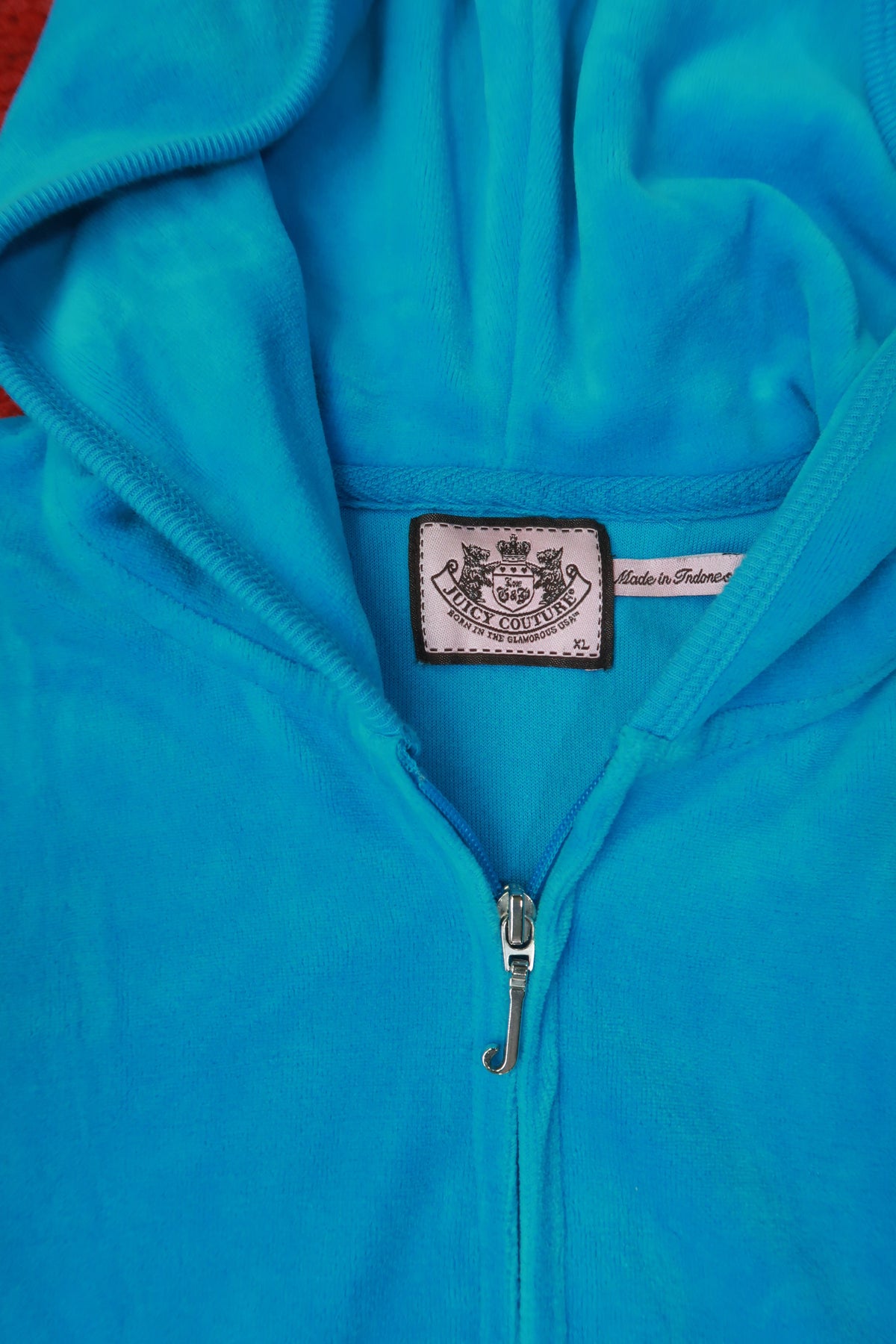 Vintage turquoise Juicy Couture velour zip-up hoodie for women, styled with the Elektra Vintage logo on the front.