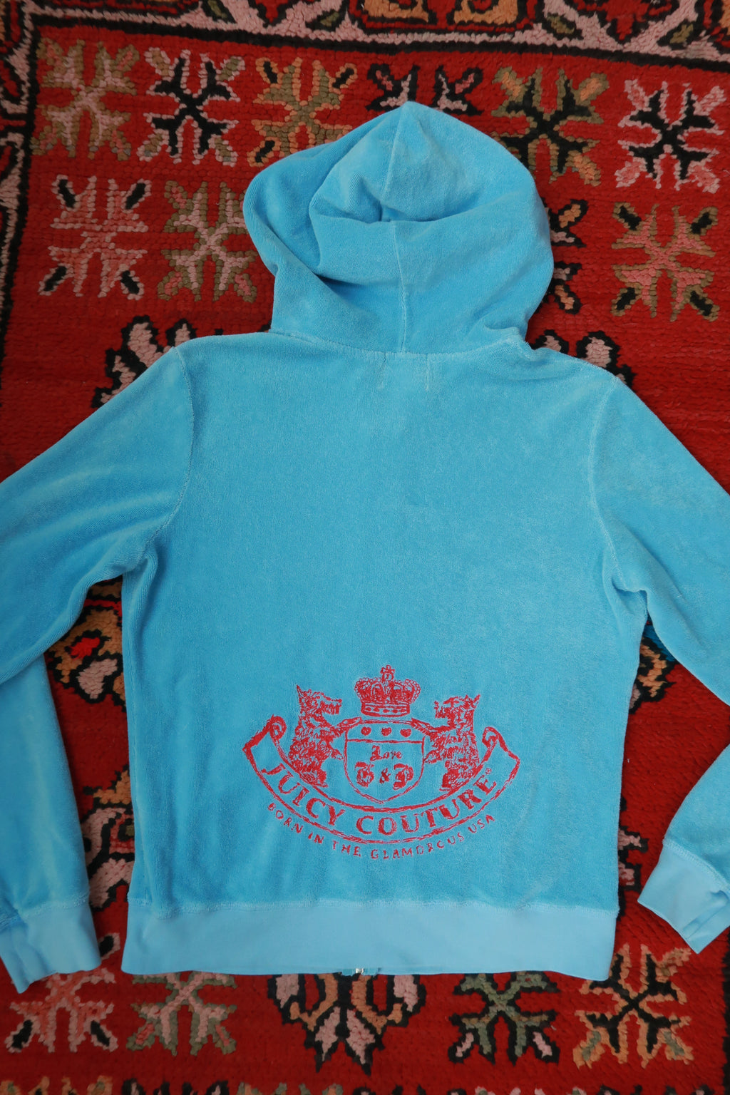 Vintage Baby Blue Juicy Couture terry cloth zip-up hoodie for women, styled with a casual fit and Elektra Vintage branding.