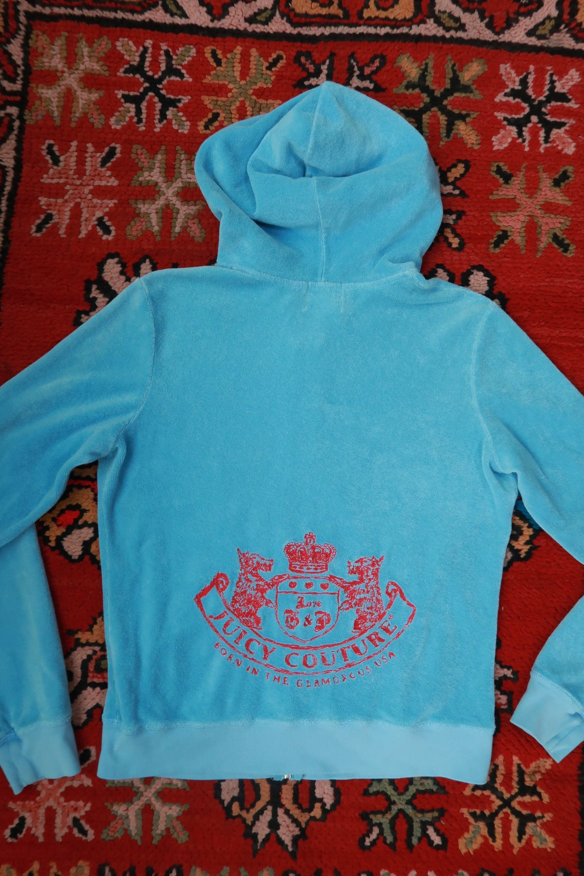 Vintage Baby Blue Juicy Couture terry cloth zip-up hoodie for women, styled with a casual fit and Elektra Vintage branding.