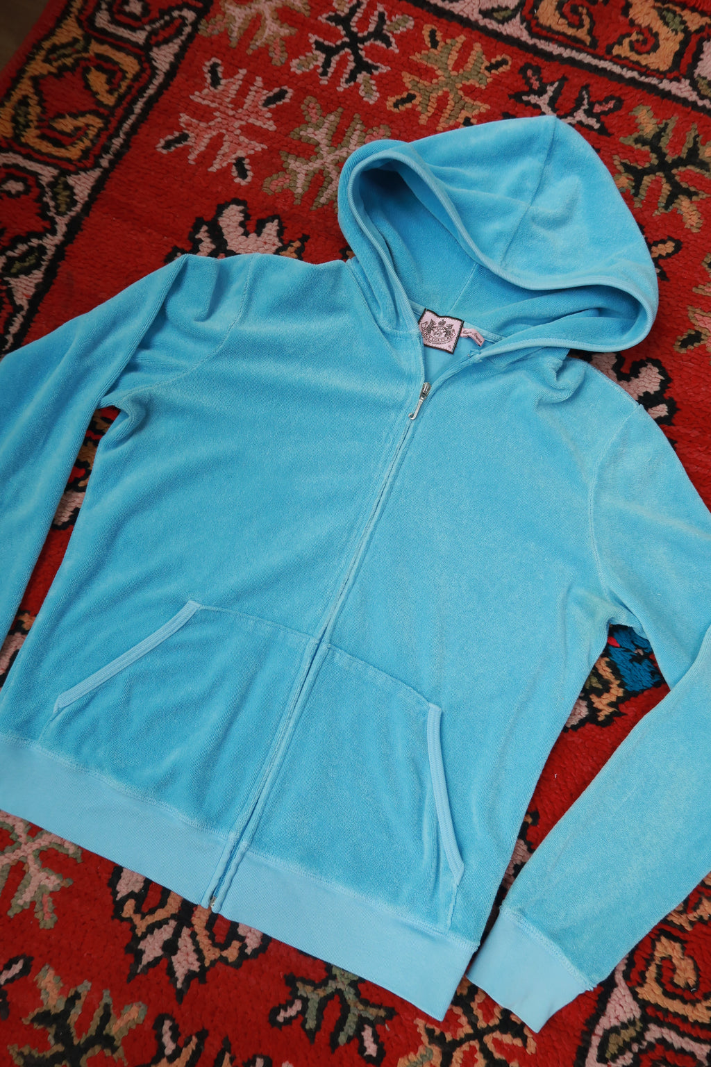Elektra Vintage women's baby blue Y2K Juicy Couture terry cloth zip-up hoodie, casual top with hood and front zipper.