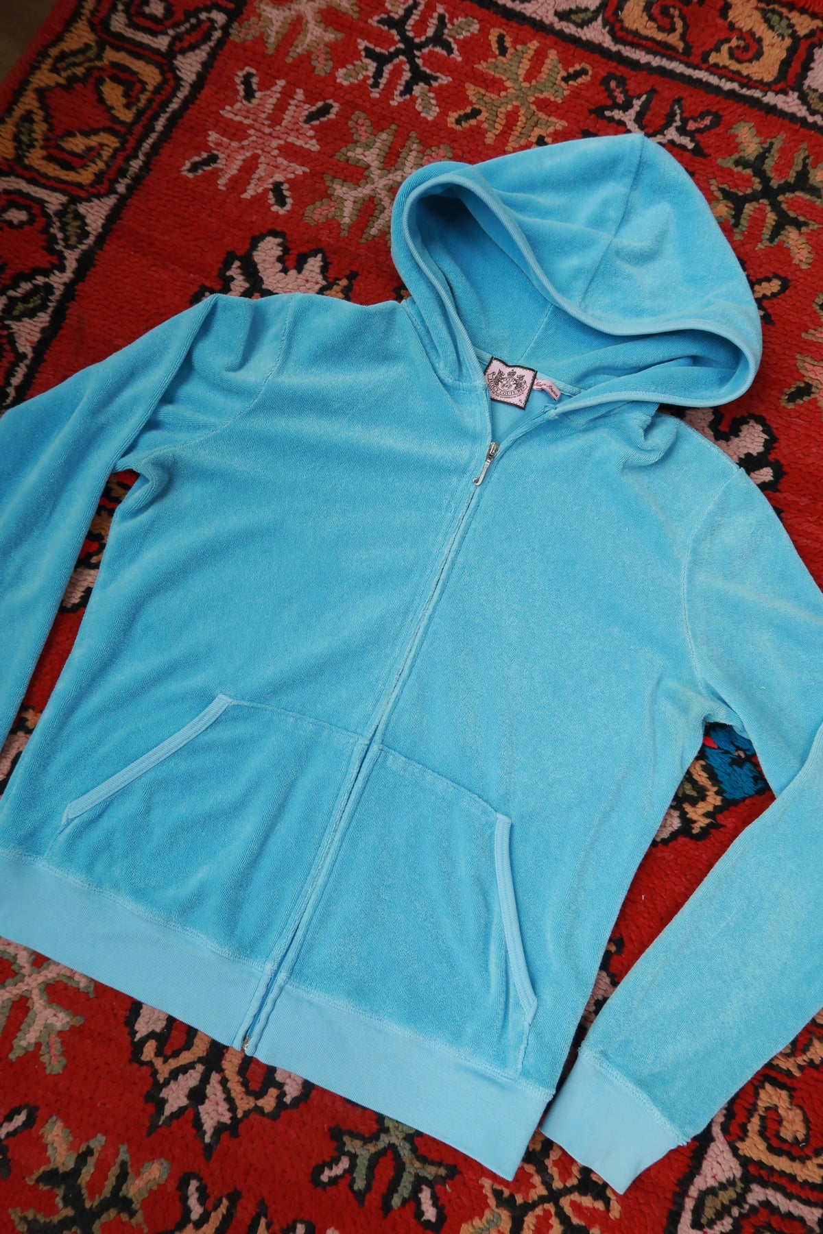 Elektra Vintage women's baby blue Y2K Juicy Couture terry cloth zip-up hoodie, casual top with hood and front zipper.