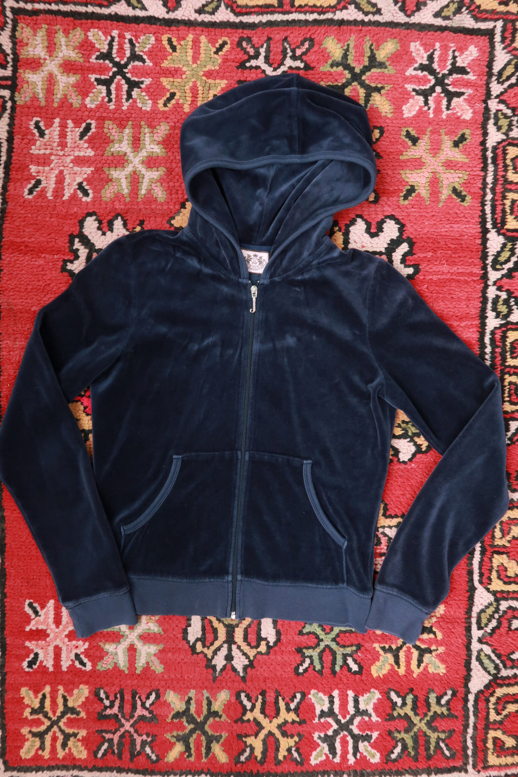 Vintage navy Juicy Couture velour zip-up hoodie for women, from Elektra Vintage, with a relaxed fit and classic Y2K style.