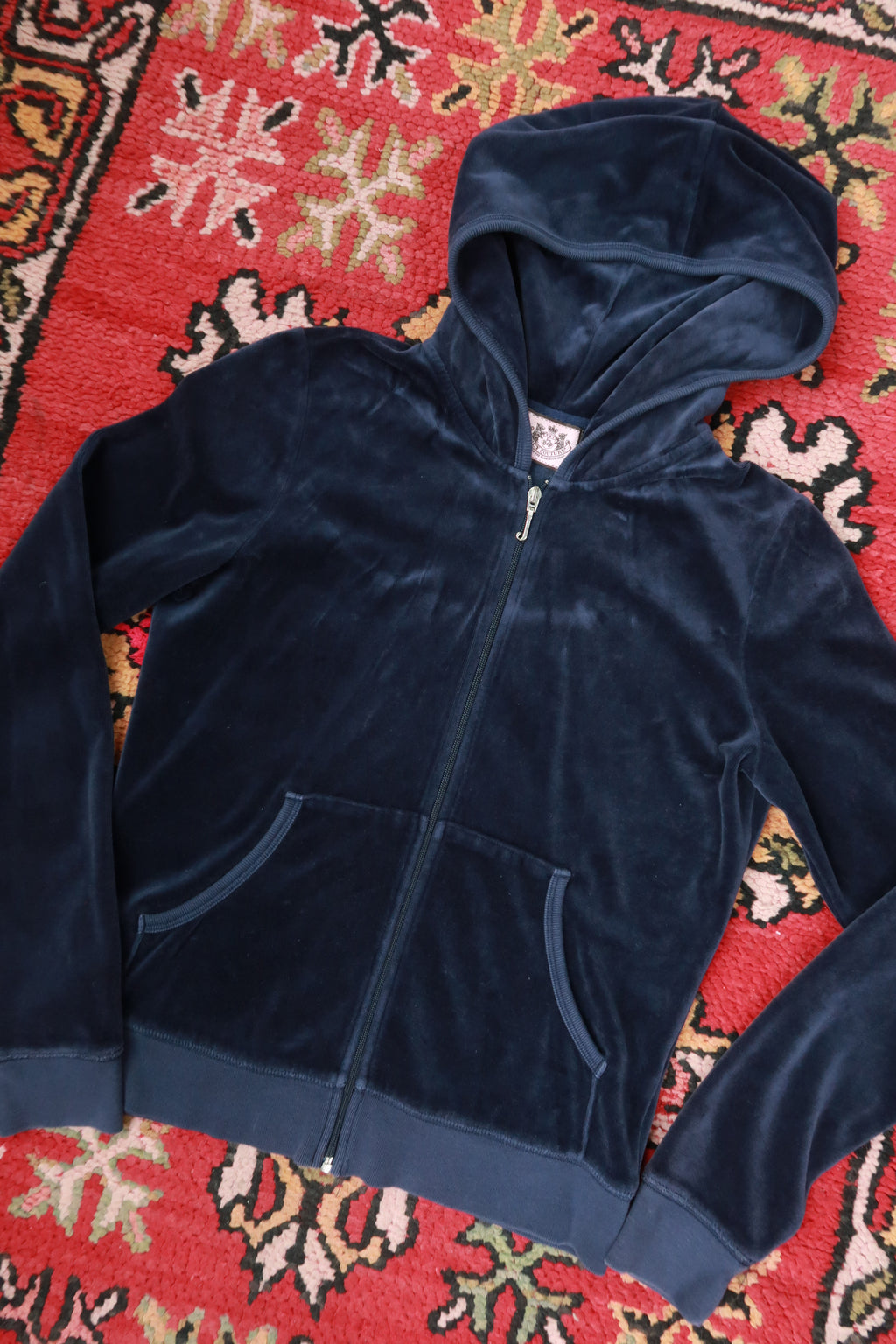 Elektra Vintage women's navy velour zip-up hoodie featuring vintage Y2K Juicy Couture style, with a hood and front zipper.
