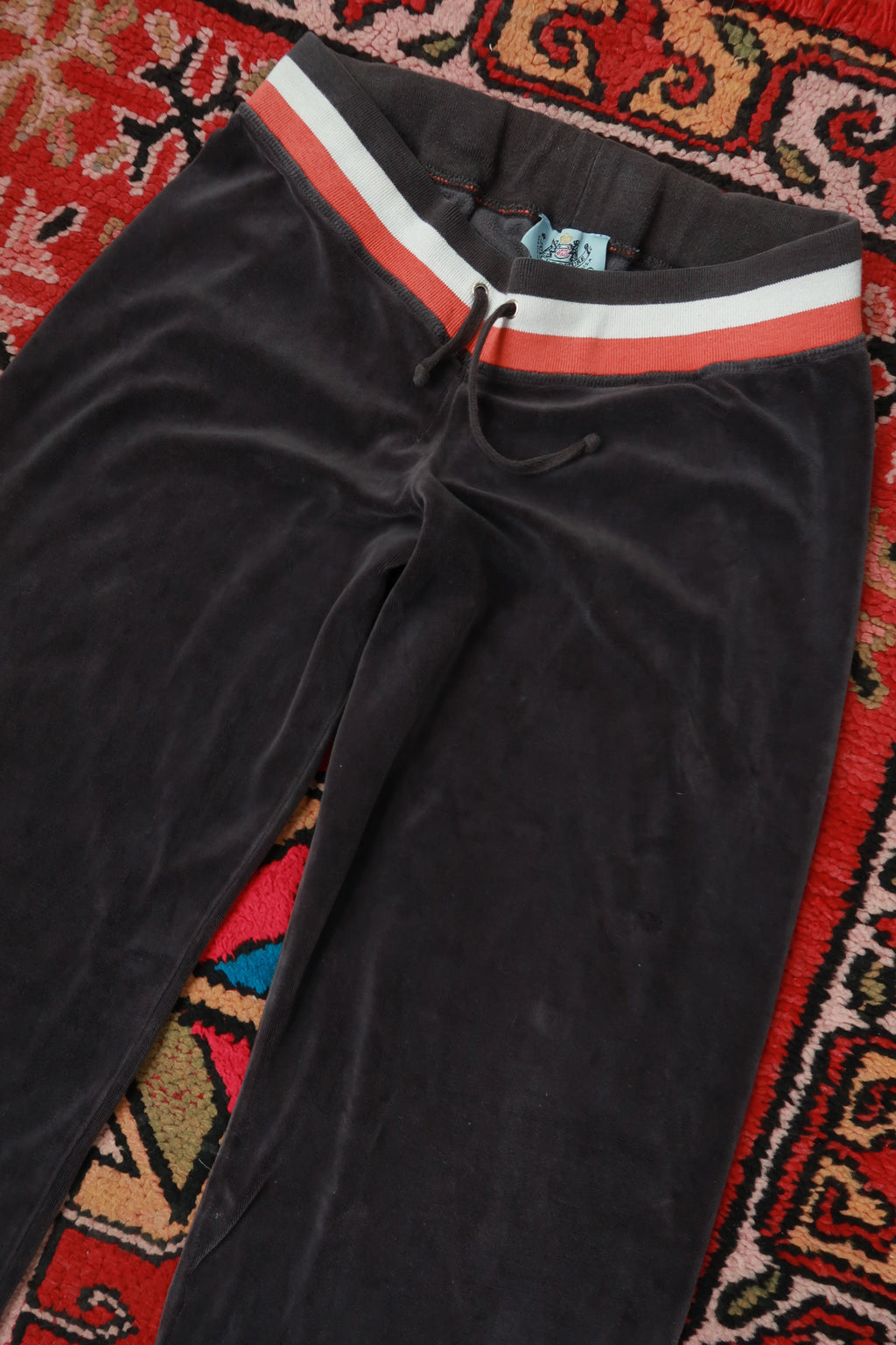 Vintage Juicy Couture brown velour wide leg lounge pants by Elektra Vintage, showing the soft fabric and relaxed fit.
