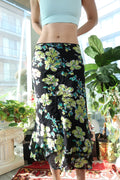 Black vintage floral midi skirt by Elektra Vintage featuring lime and aqua blooming floral print.