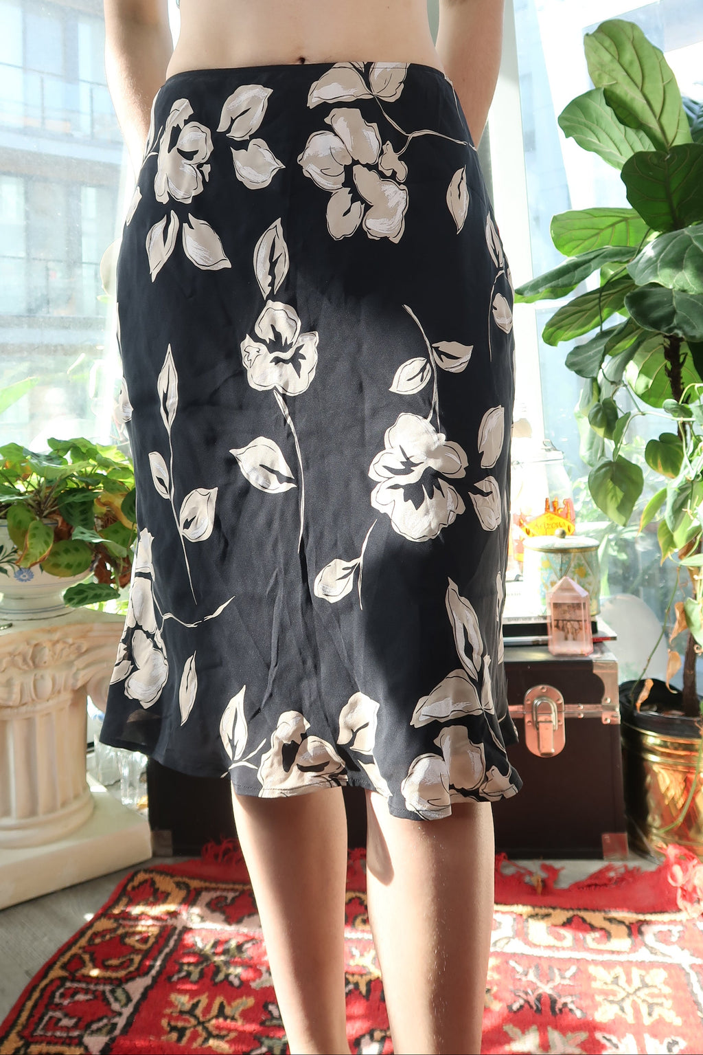 Vintage 100% silk black floral skirt by Elektra Vintage, featuring a bias cut and flowy design.