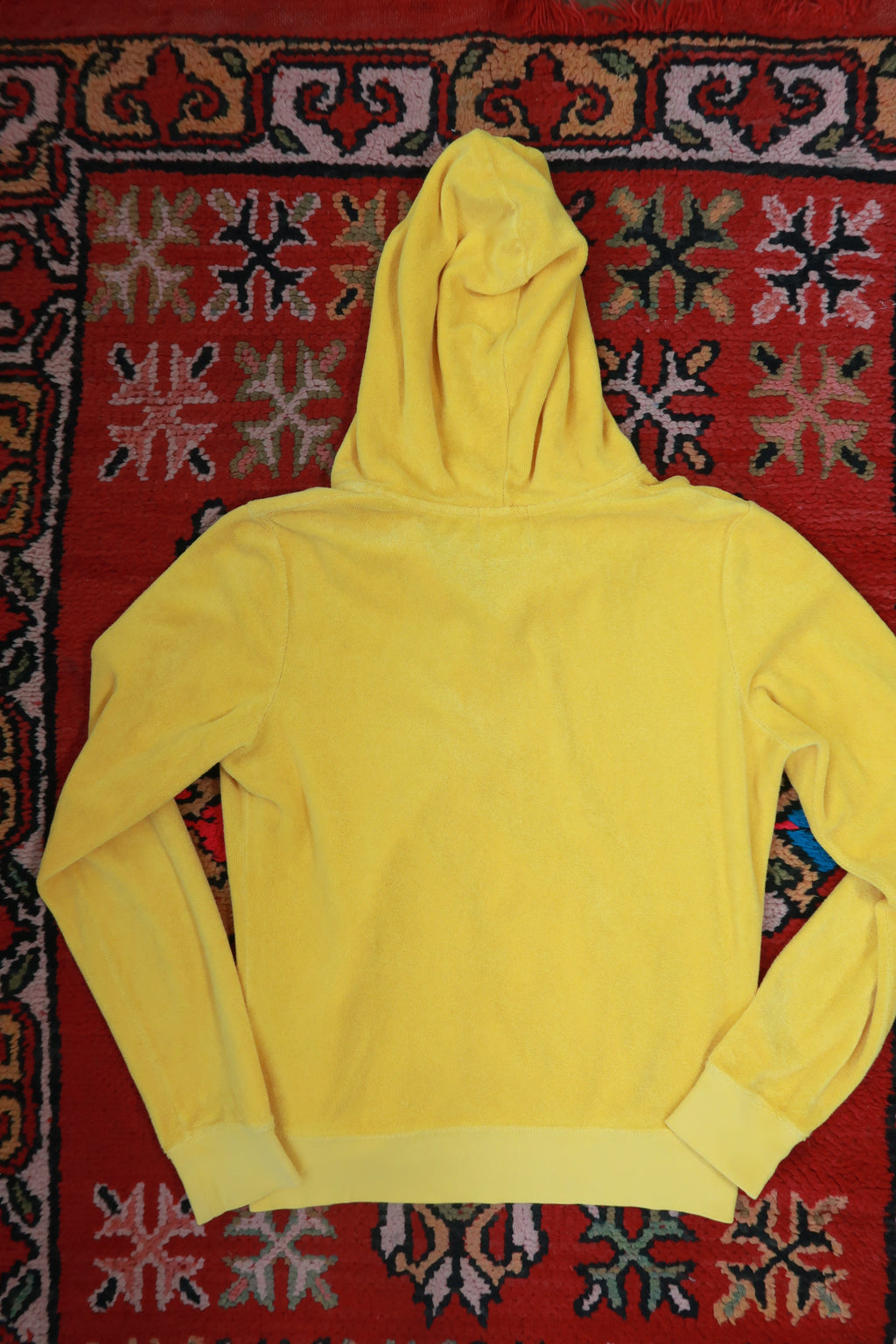 Yellow Juicy Couture terry cloth zip-up hoodie by Elektra Vintage, featuring vintage Y2K style and casual, cozy fabric.