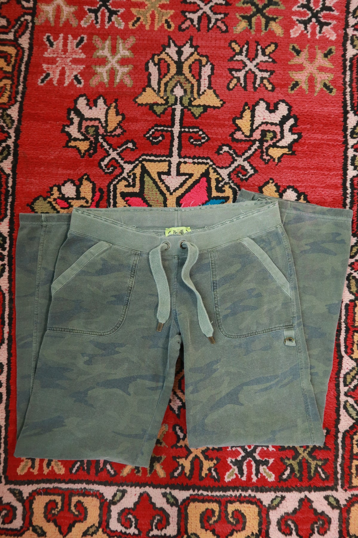Vintage Y2K Juicy Couture camo tracksuit set by Elektra Vintage, featuring a matching jacket and pants with a bold camouflage pattern.