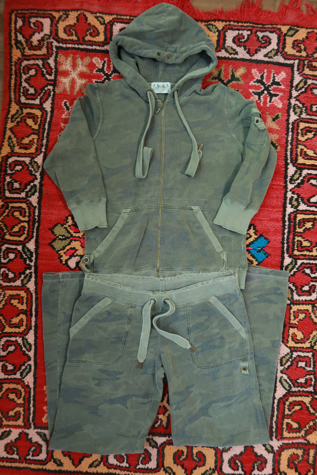 Vintage Y2K Juicy Couture camo tracksuit set by Elektra Vintage, featuring a matching jacket and pants with camouflage print.