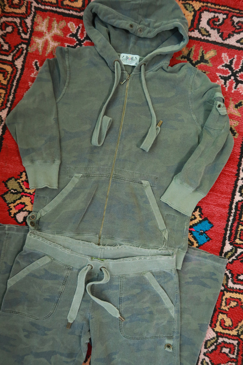 Vintage Y2K Juicy Couture camo tracksuit set by Elektra Vintage, featuring a matching jacket and pants in military-inspired print.