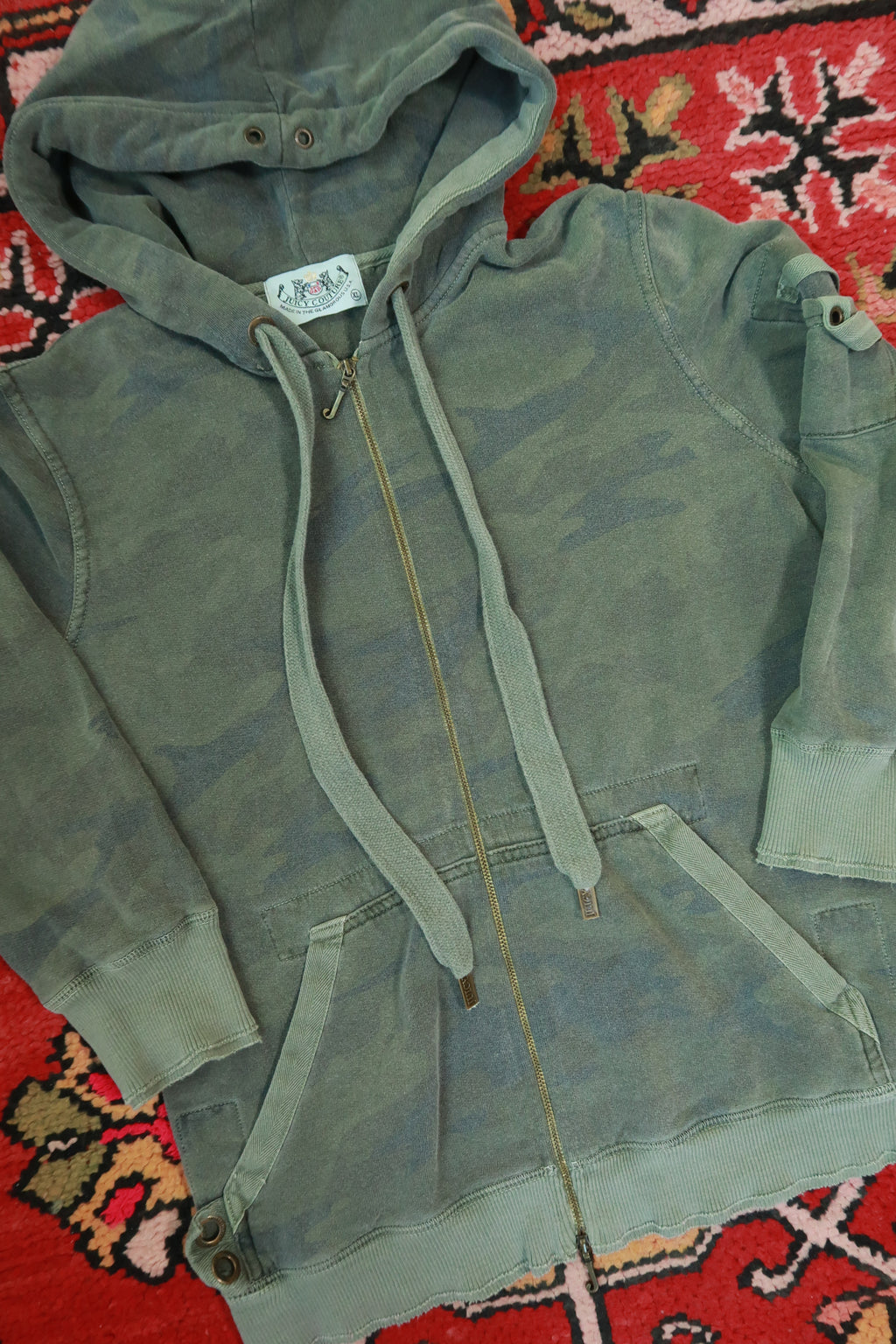Vintage Y2K Juicy Couture camo tracksuit set by Elektra Vintage, featuring a matching jacket and sweatpants in camouflage print.