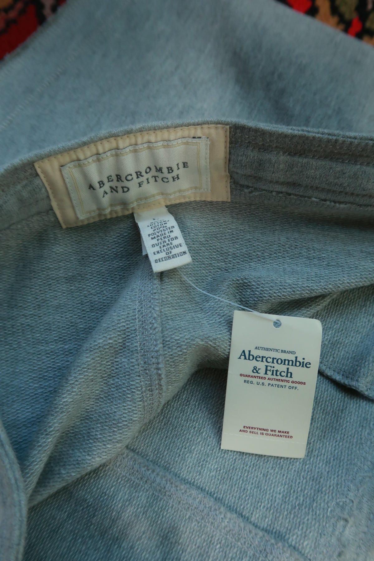 Vintage Abercrombie & Fitch mini skirt by Elektra Vintage, showing a high-waisted Y2K style with denim fabric and classic design.