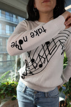 Load image into Gallery viewer, Vintage Musical Note Graphic Knit Sweater – “Take Note” Sleeve Detail
