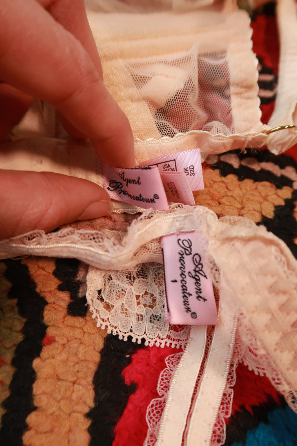 Elektra Vintage Agent Provocateur sheer nude blush lace lingerie set displayed on a mannequin with intricate lace details.