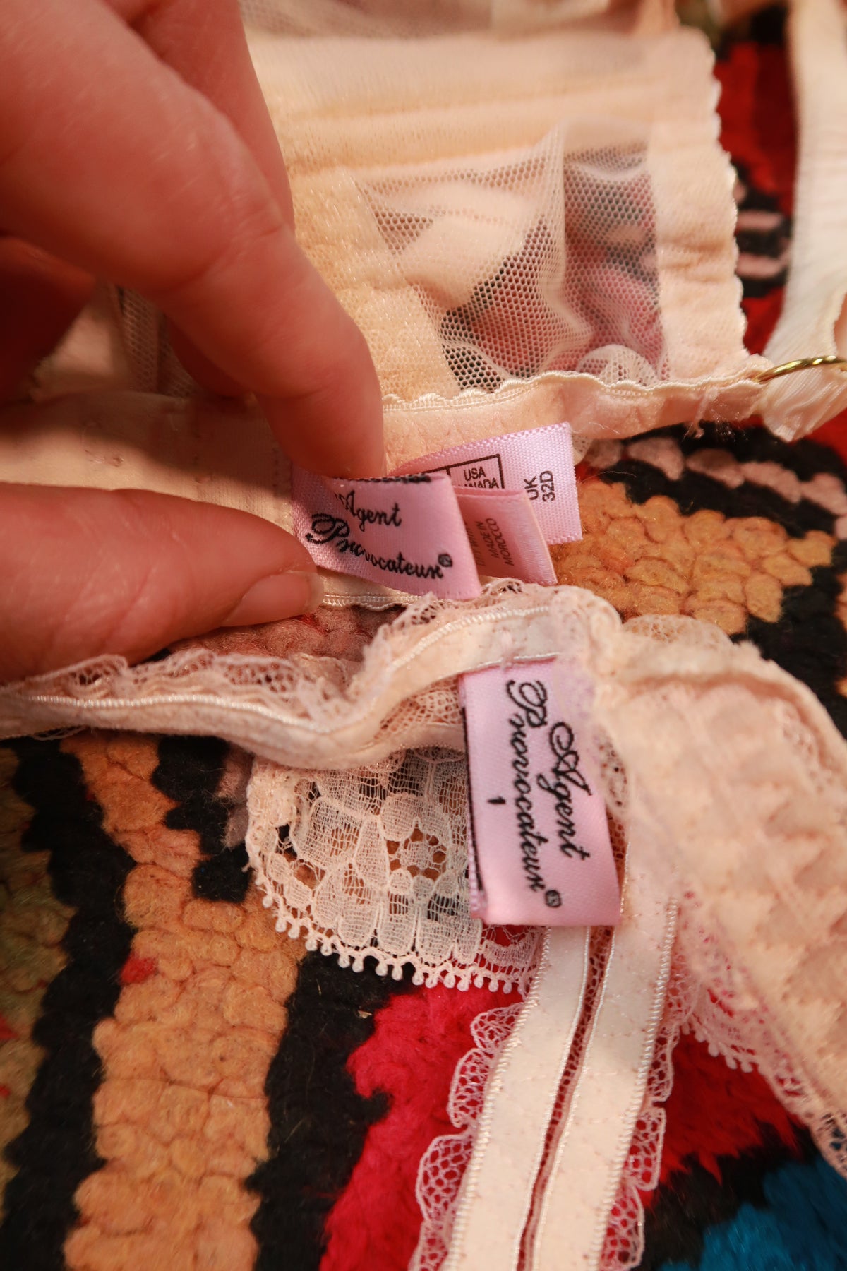 Elektra Vintage Agent Provocateur sheer nude blush lace lingerie set displayed on a mannequin with intricate lace details.