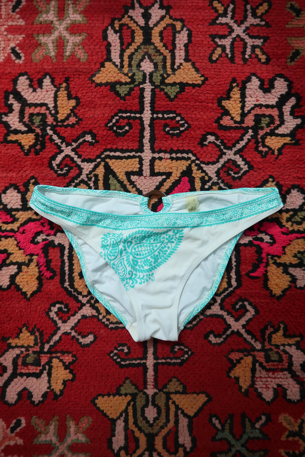 White and turquoise paisley vintage bikini bottom from the 2000s by Elektra Vintage, featuring a classic swimwear design.