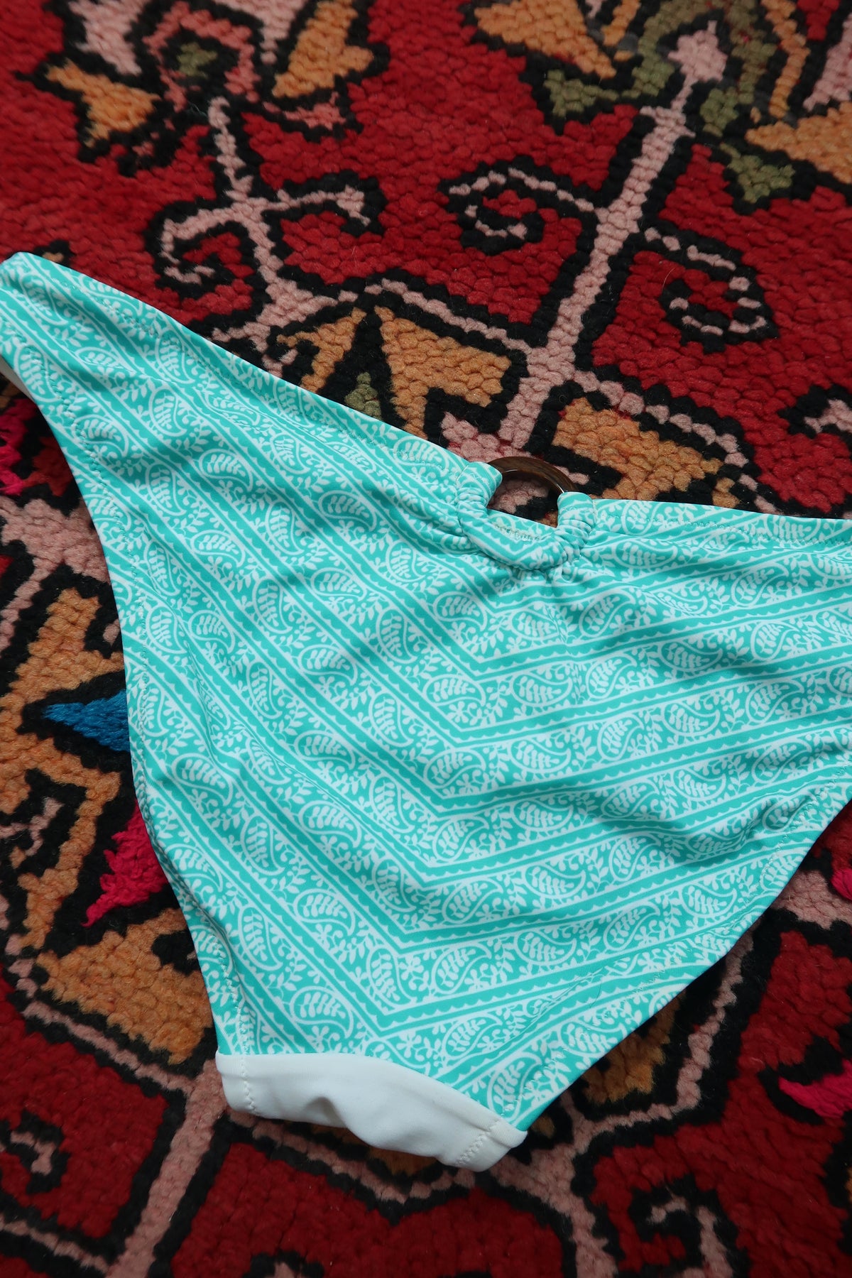 White and turquoise paisley vintage bikini bottom from the 2000s Victoria’s Secret collection by Elektra Vintage.