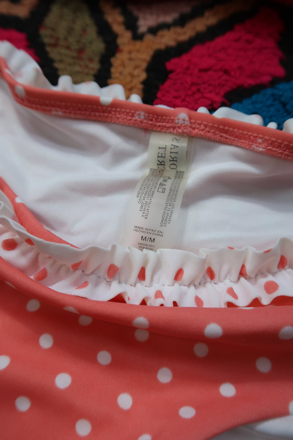 Vintage 2000s Victoria’s Secret polka dot bikini set in coral and white with ruffle details, styled by Elektra Vintage.