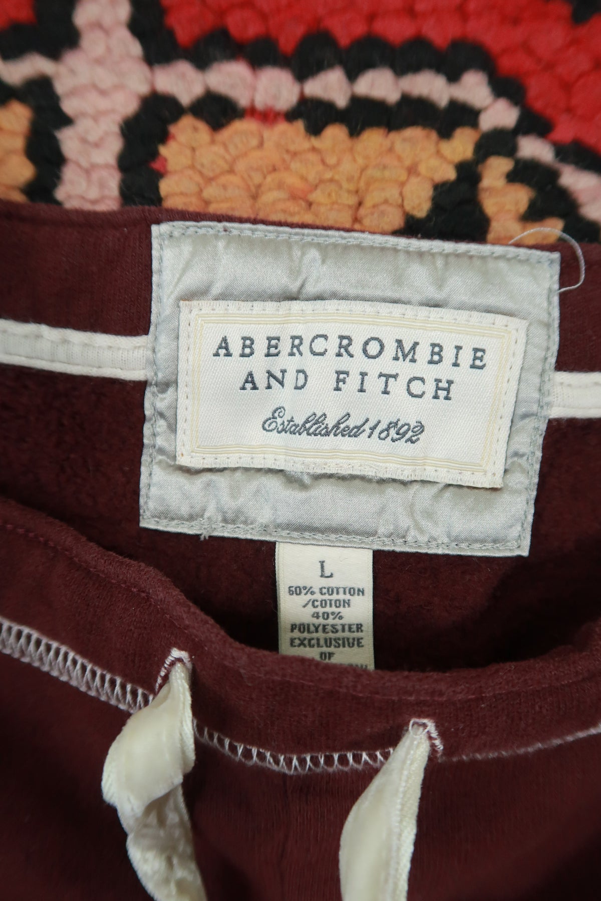 Vintage Y2K burgundy Abercrombie & Fitch dolphin shorts for women, styled with casual summer fashion.