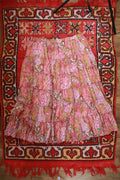 Vintage pink paisley boho midi skirt by Elektra Vintage with tiered design and flowing fabric, perfect for bohemian style.