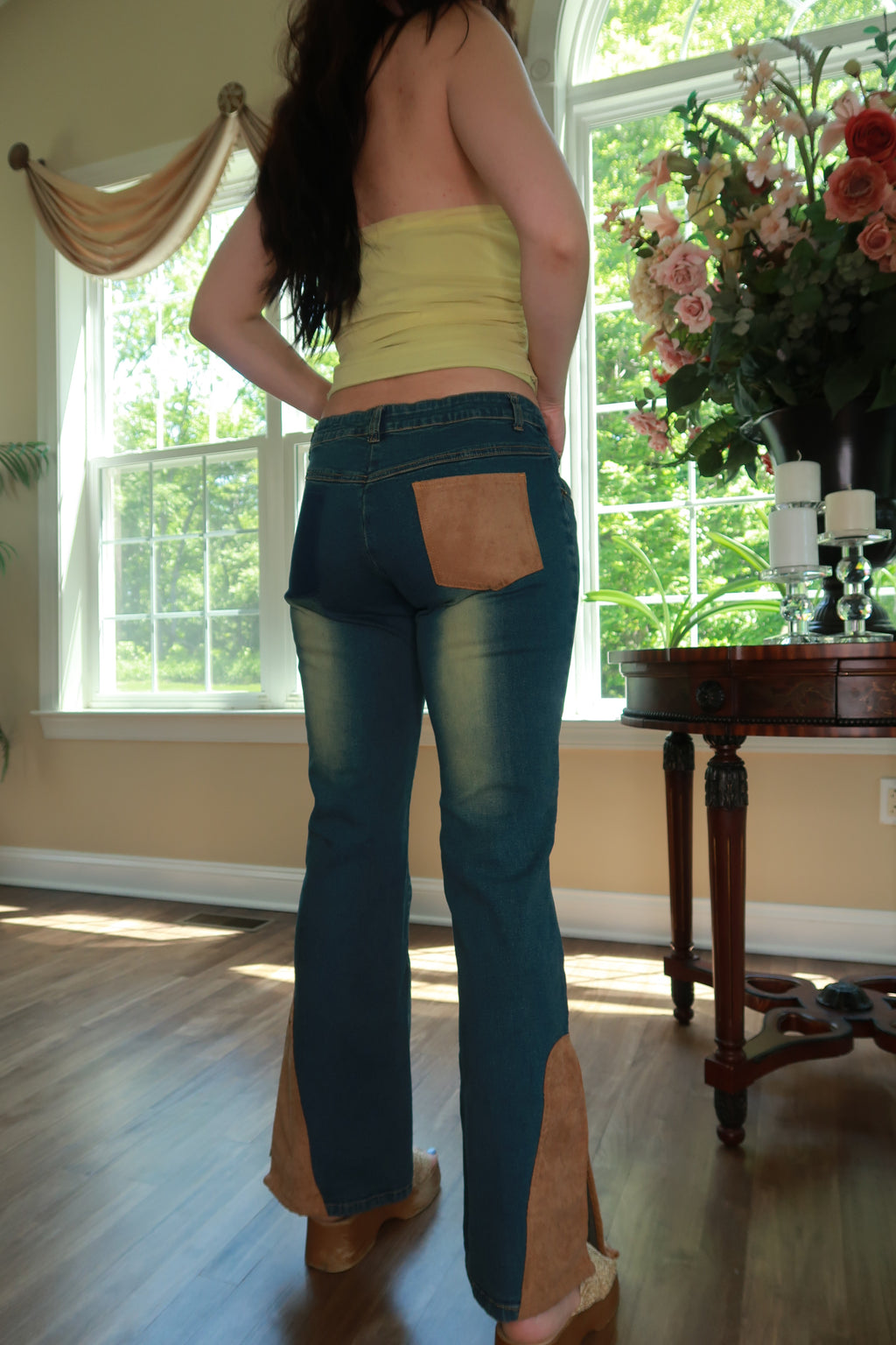Women's vintage Y2K denim flare jeans with suede panel details by Elektra Vintage, featuring high waist and retro style.
