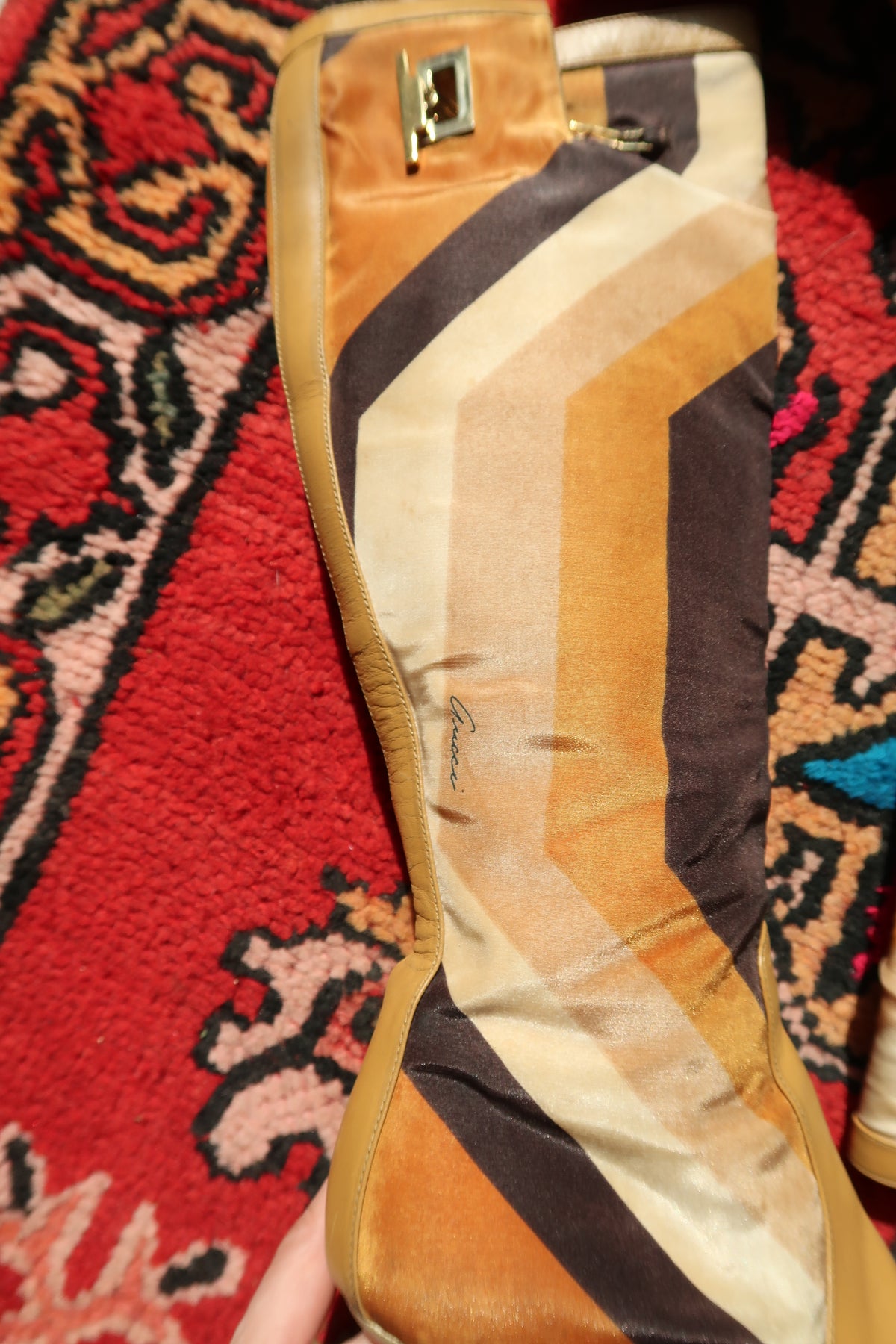 Gucci by Tom Ford vintage leather boots with printed silk, featuring a stylish high heel, showcased against a neutral background.