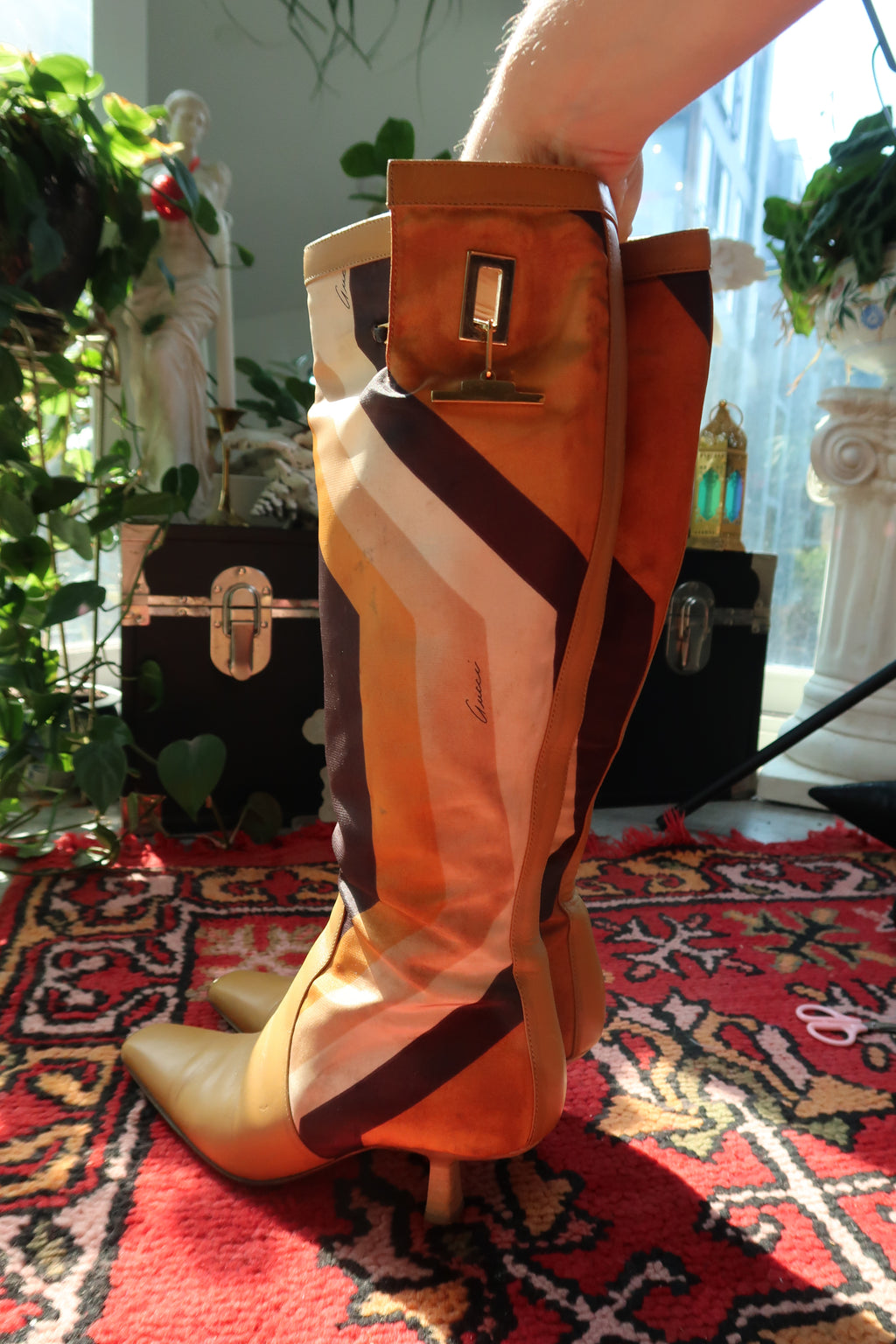 Vintage Gucci by Tom Ford Fall/Winter 2000 leather boots with printed silk and elegant heels.