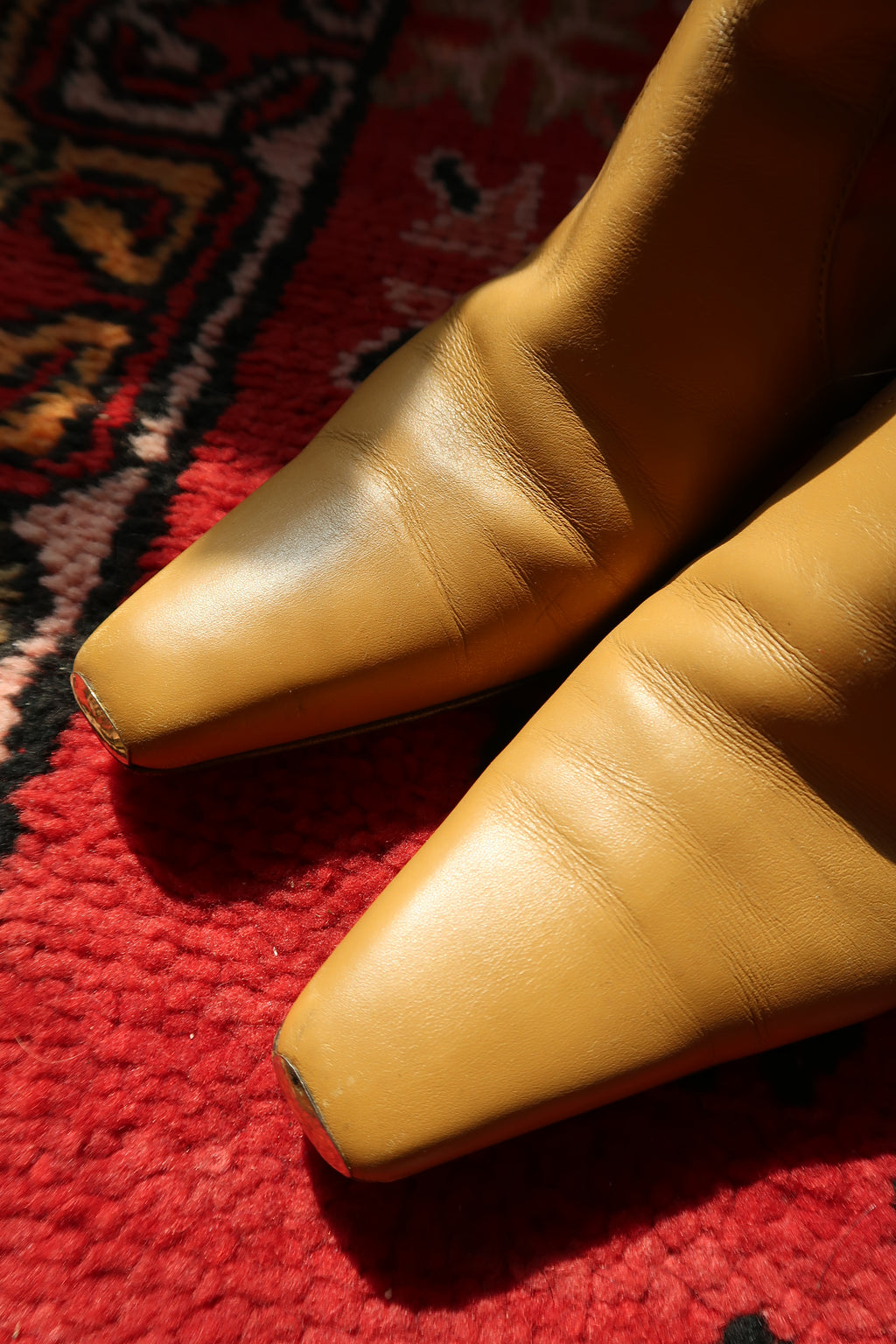Vintage Gucci by Tom Ford Fall/Winter 2000 leather boots with iconic printed silk and elegant heeled design.