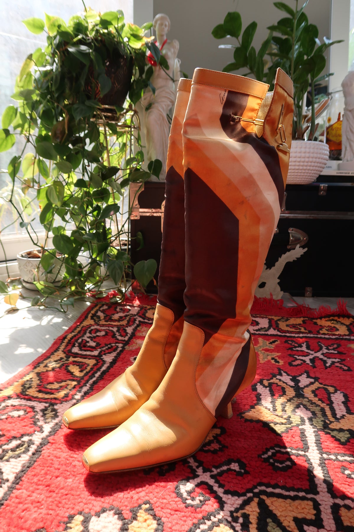 Vintage Gucci by Tom Ford Fall/Winter 2000 leather boots with printed silk and stylish heels.