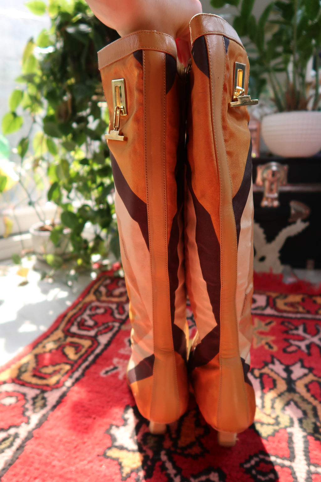 Vintage Gucci by Tom Ford Fall/Winter 2000 leather boots with iconic printed silk and stylish heels.
