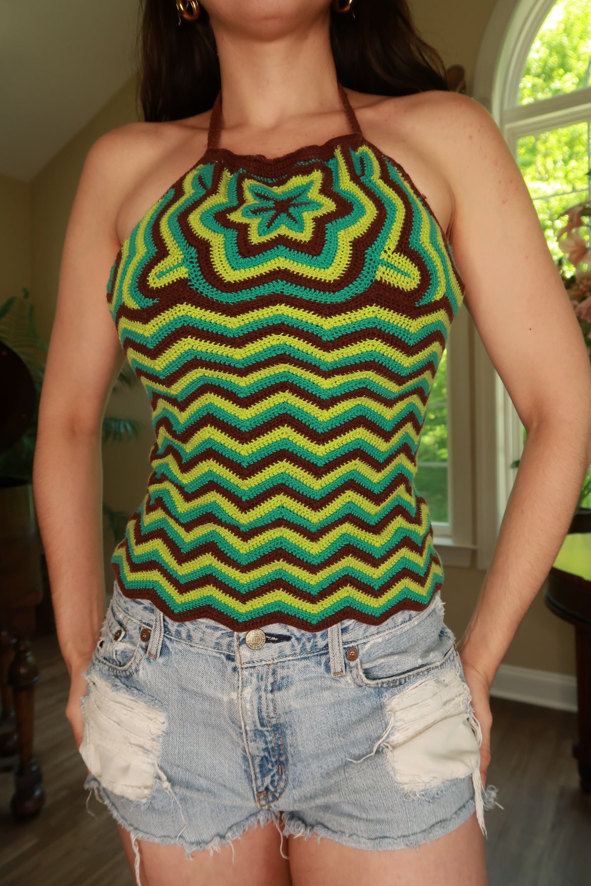 Vintage 2000s crochet chevron halter top for women by Elektra Vintage, showcasing the detailed knit pattern and halter neckline.