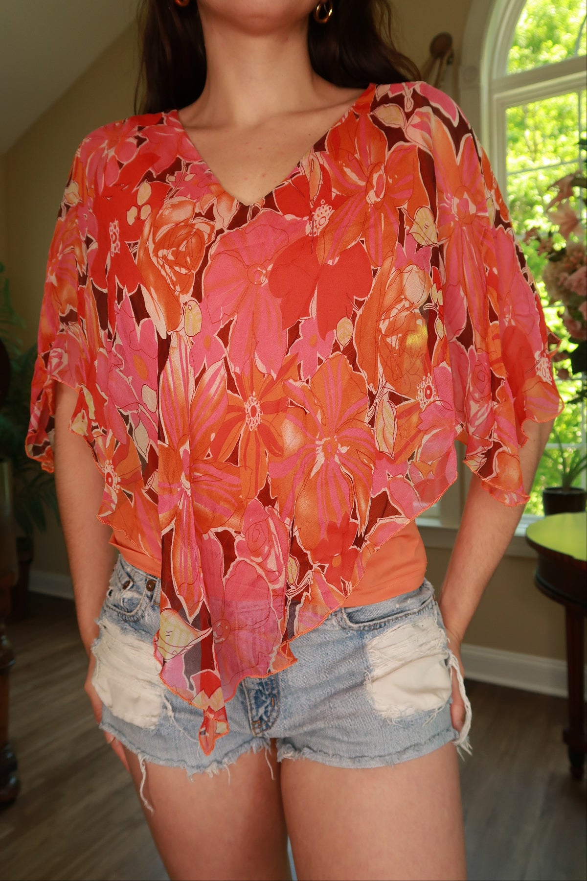 Vintage pink orange floral silk chiffon overlay blouse for women by Elektra Vintage, featuring a delicate floral pattern and flowing fabric.