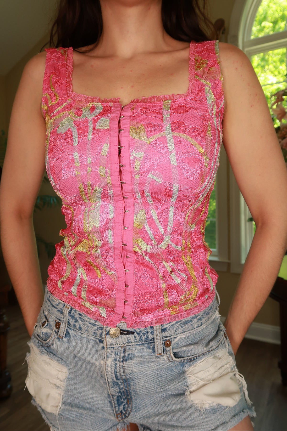 Elektra Vintage women's pink lace corset top with hook front, vintage 2000s style, featuring delicate lace details and fitted design.
