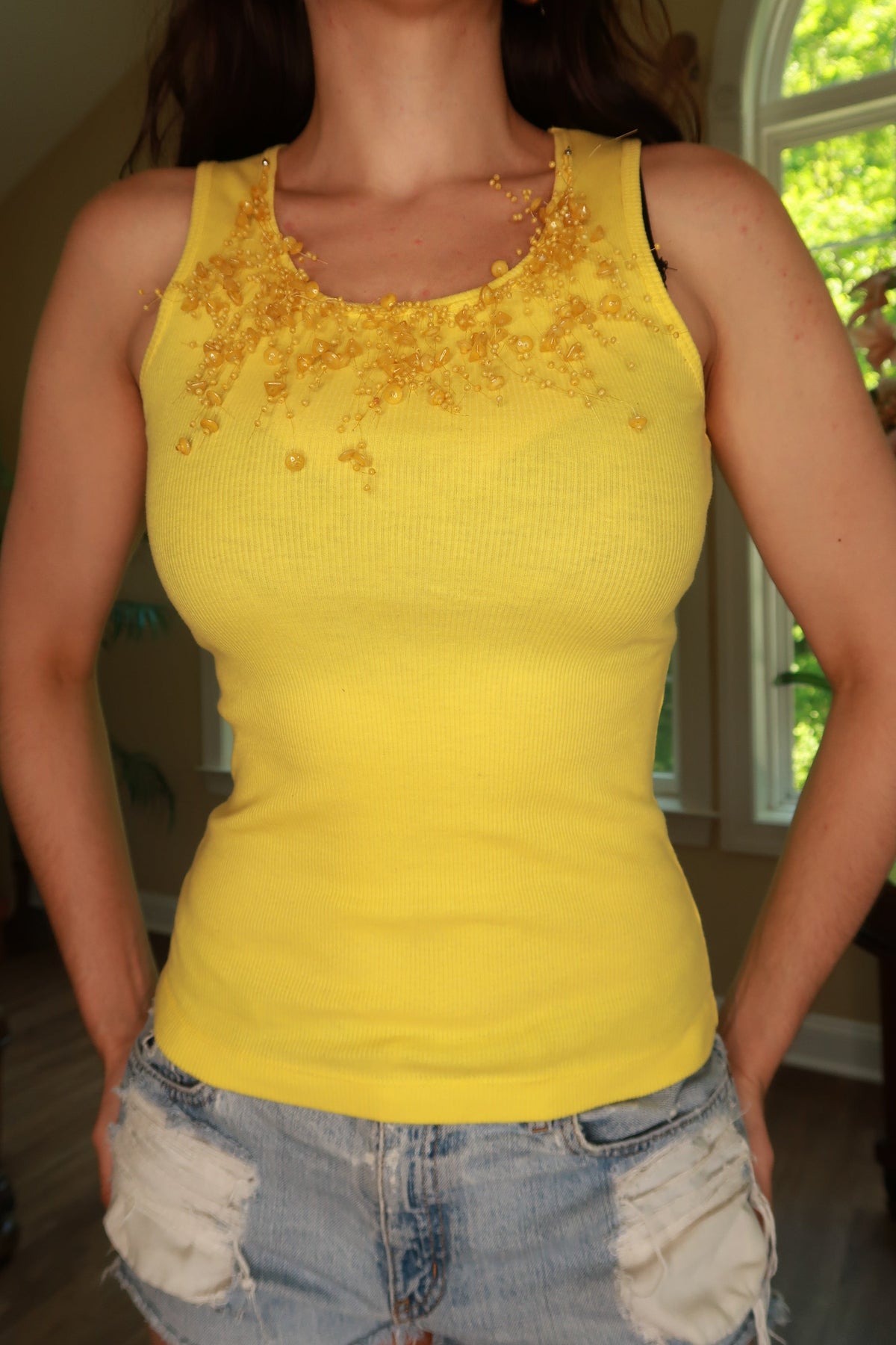 Women's vintage yellow beaded embellished tank top by Elektra Vintage, featuring intricate beadwork and a sleeveless design.