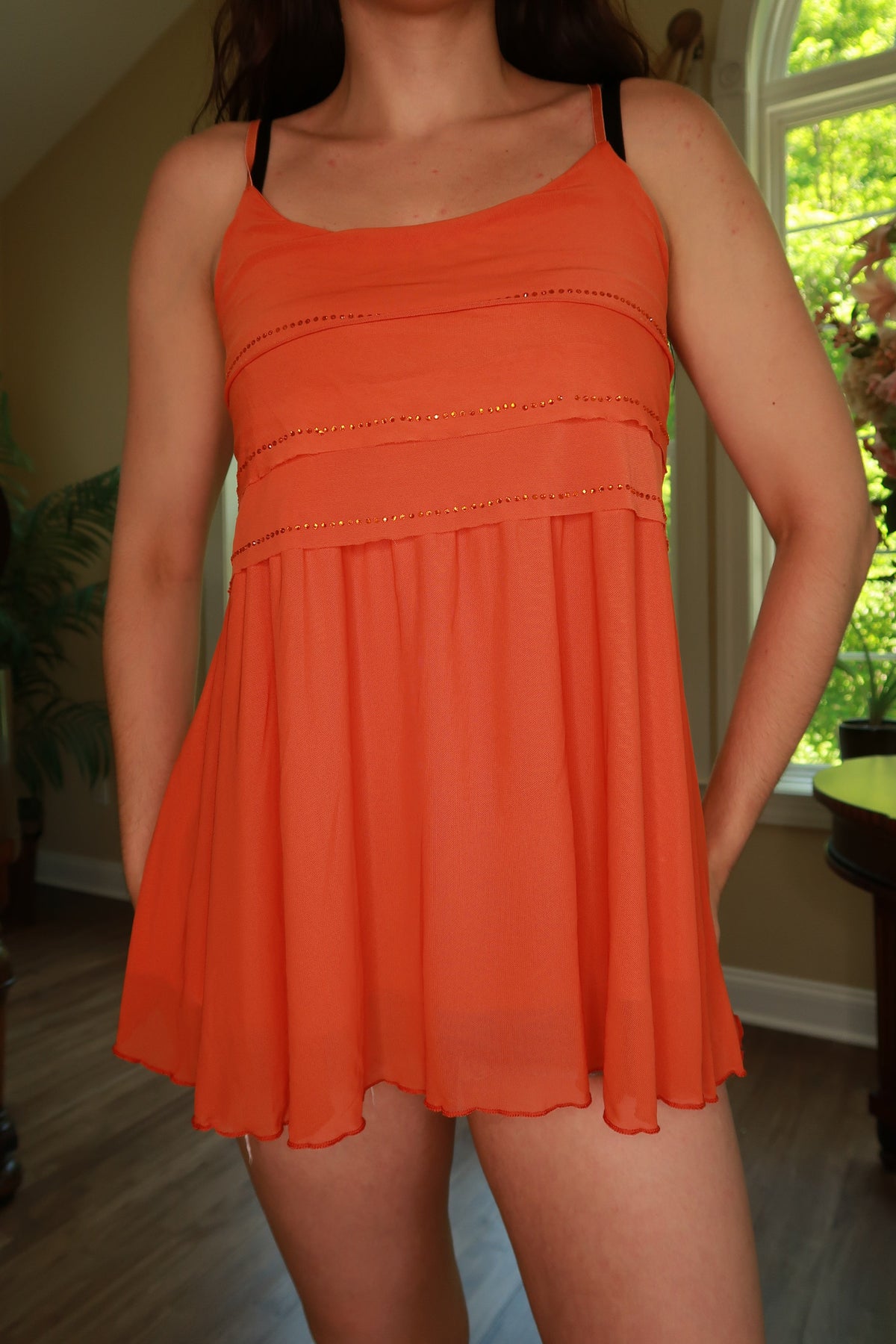Vintage 2000s orange rhinestone tank top for women, Elektra Vintage babydoll style, featuring a flowy fit and sparkling embellishments.
