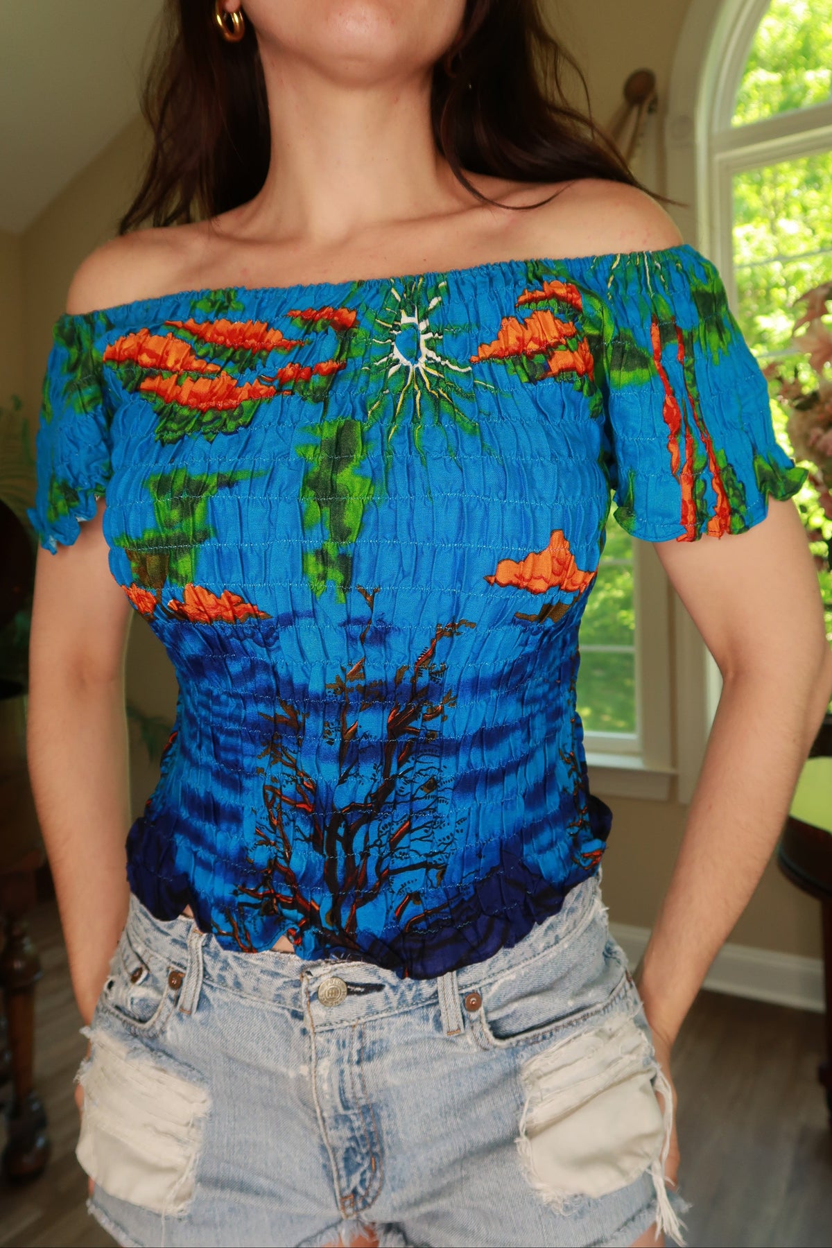 Blue smocked tropical off-shoulder women's top by Elektra Vintage, vintage 2000s style with vibrant print and relaxed fit.