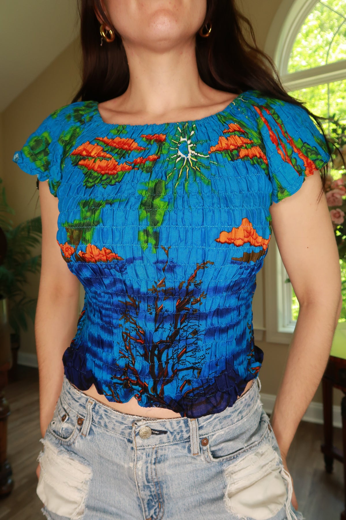 Vintage 2000s blue smocked tropical off-shoulder women's top by Elektra Vintage, featuring a vibrant, summery design.