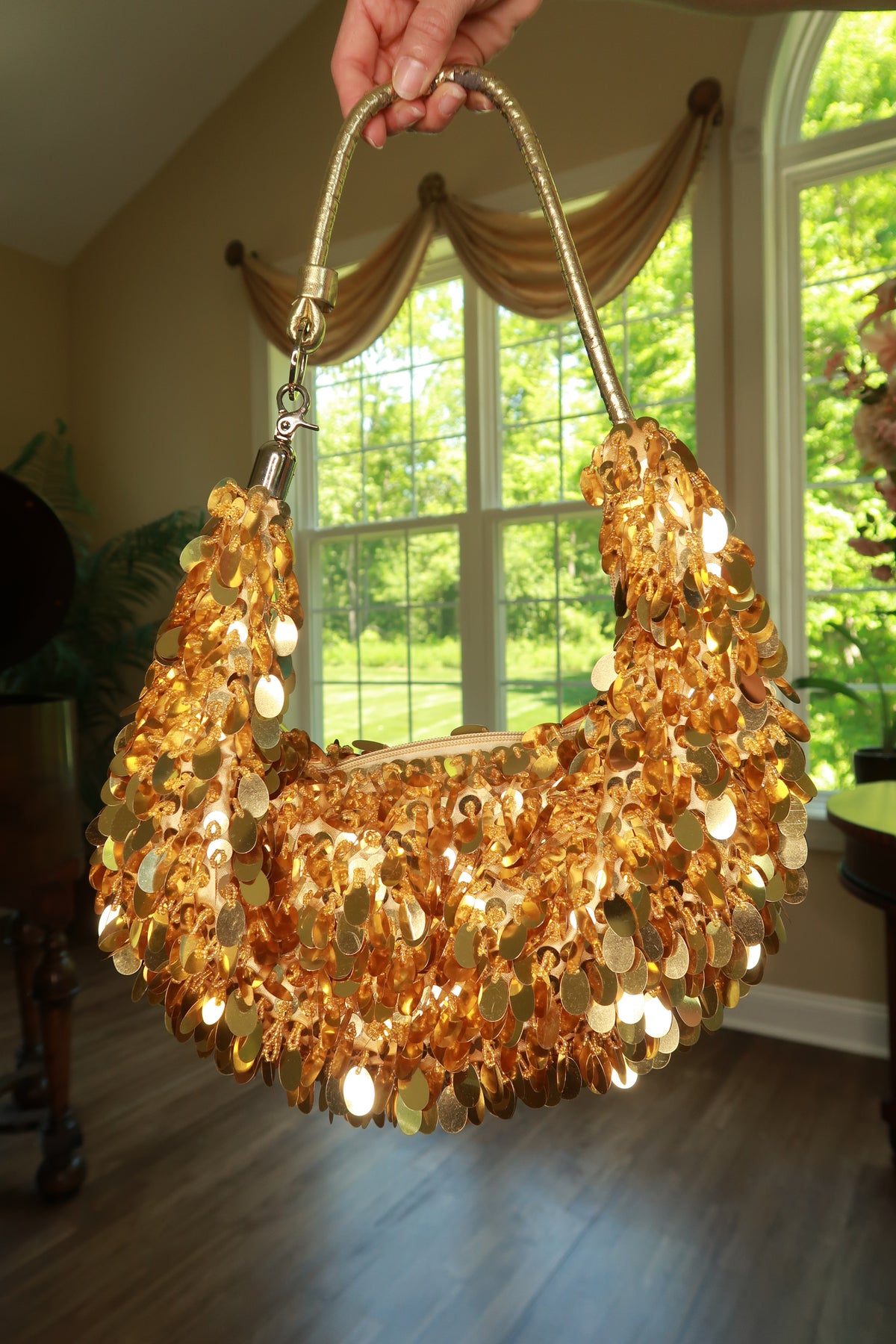 Elektra Vintage 2000s gold sequin hobo shoulder bag with a slouchy design and shoulder strap, perfect for retro fashion styles.